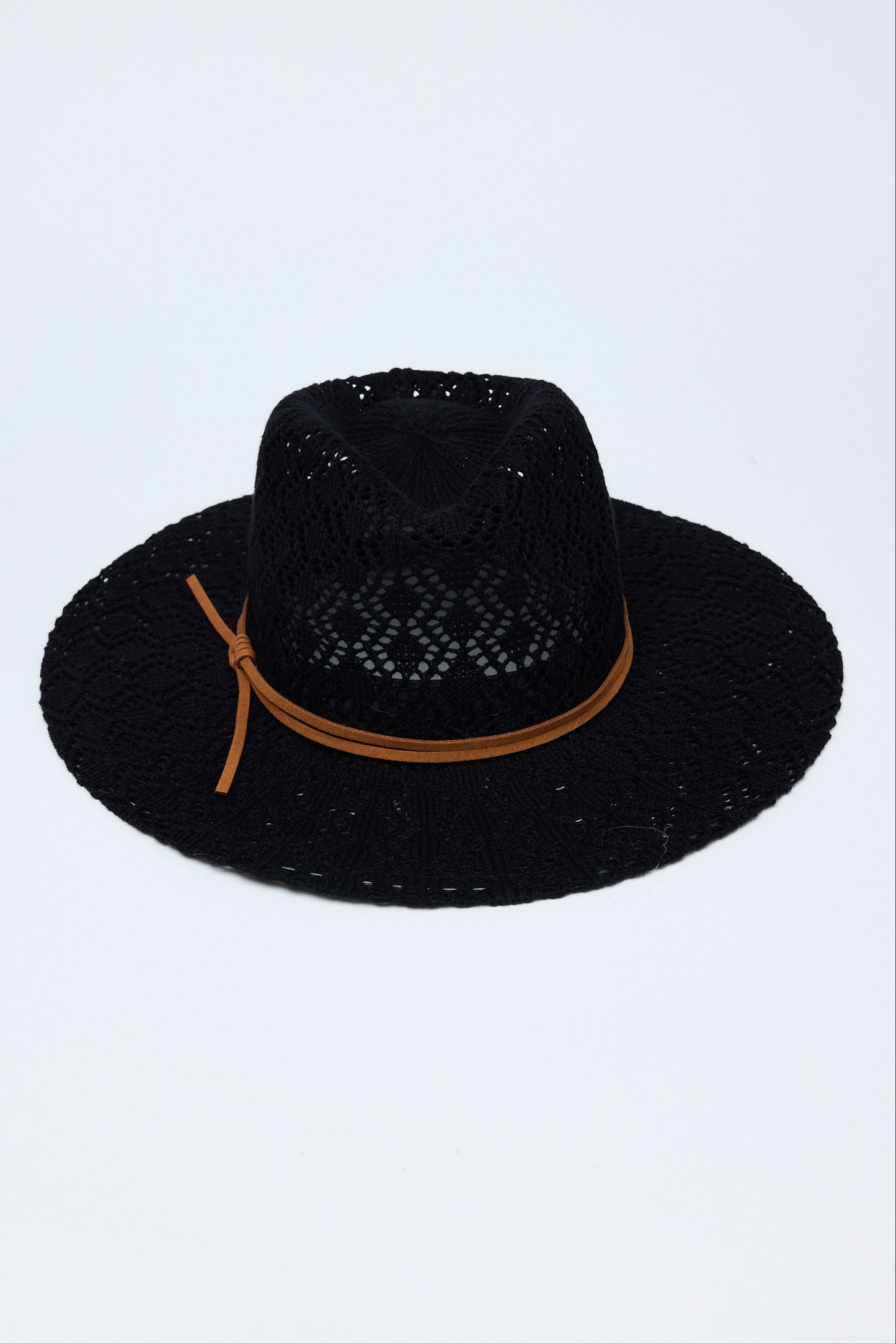 Black hat with a brown band on a light gray background