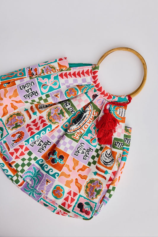 Colorful fabric headband with a tassel on a white background