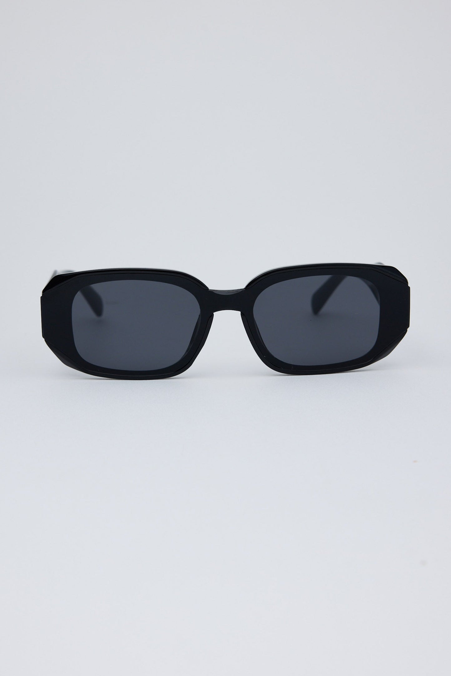 Black sunglasses on a white background
