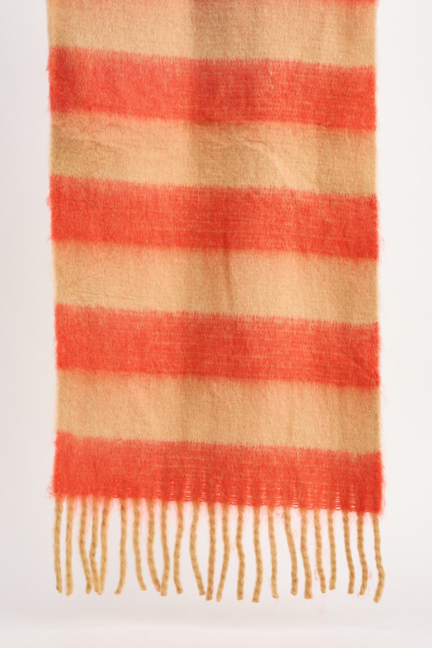 Striped scarf with red and beige colors on a white background