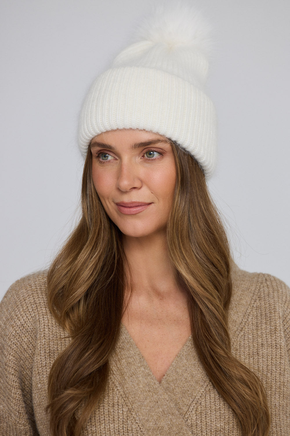 Solaro Beanie - Off White beanie in off white with rib knit texture, alternate view on white background