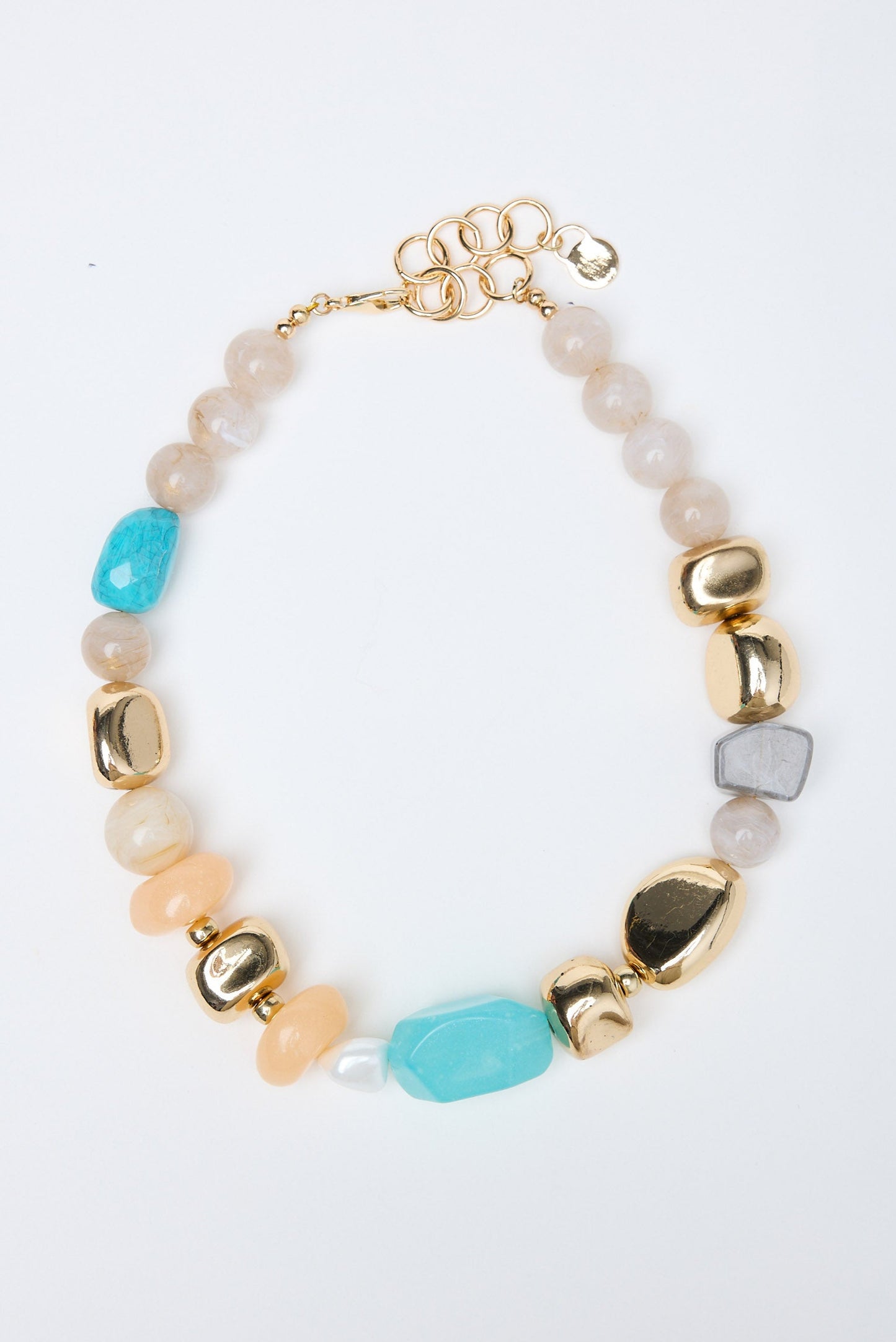 Multicolored beaded necklace on a white background