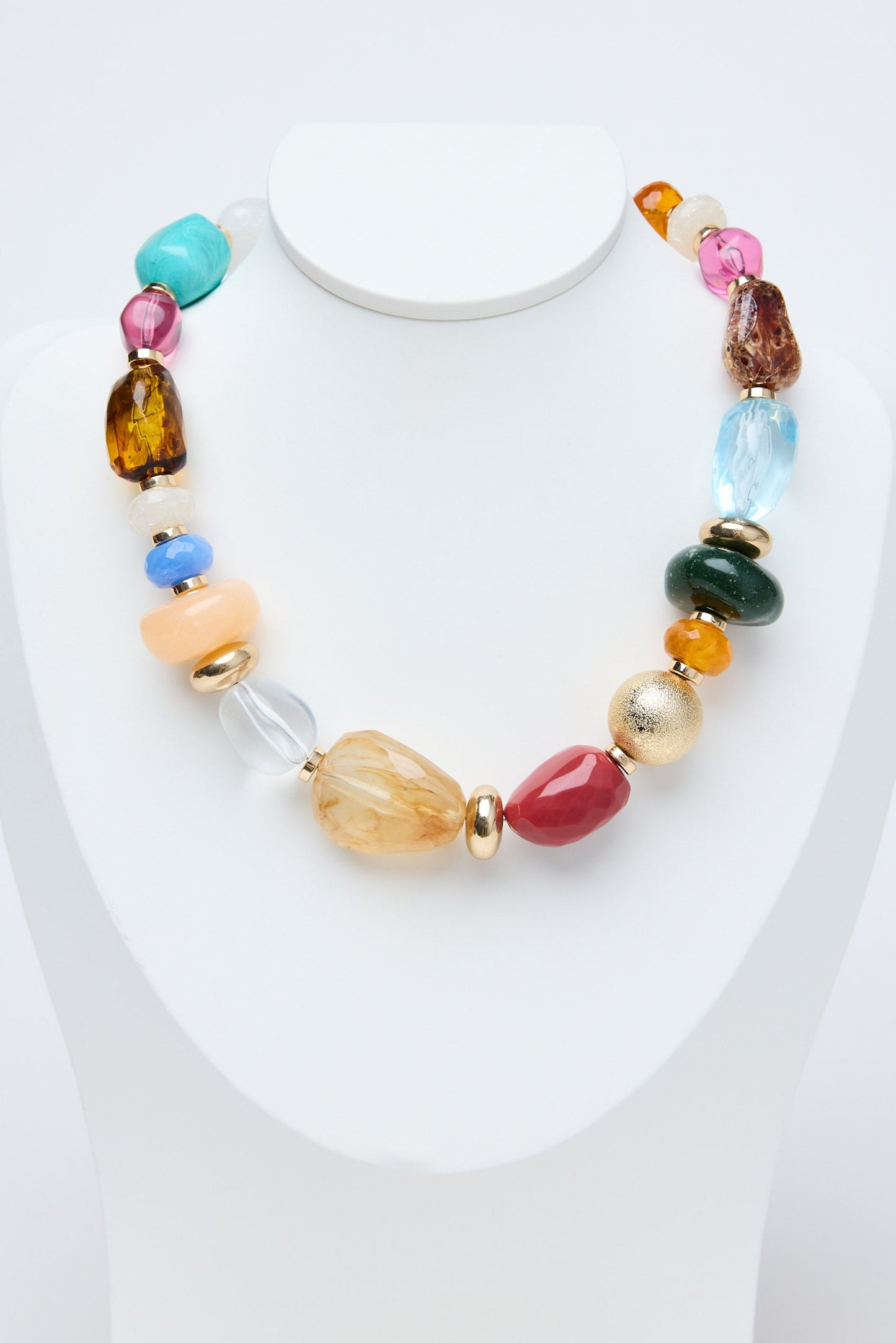 Multicolored beaded necklace on a white background