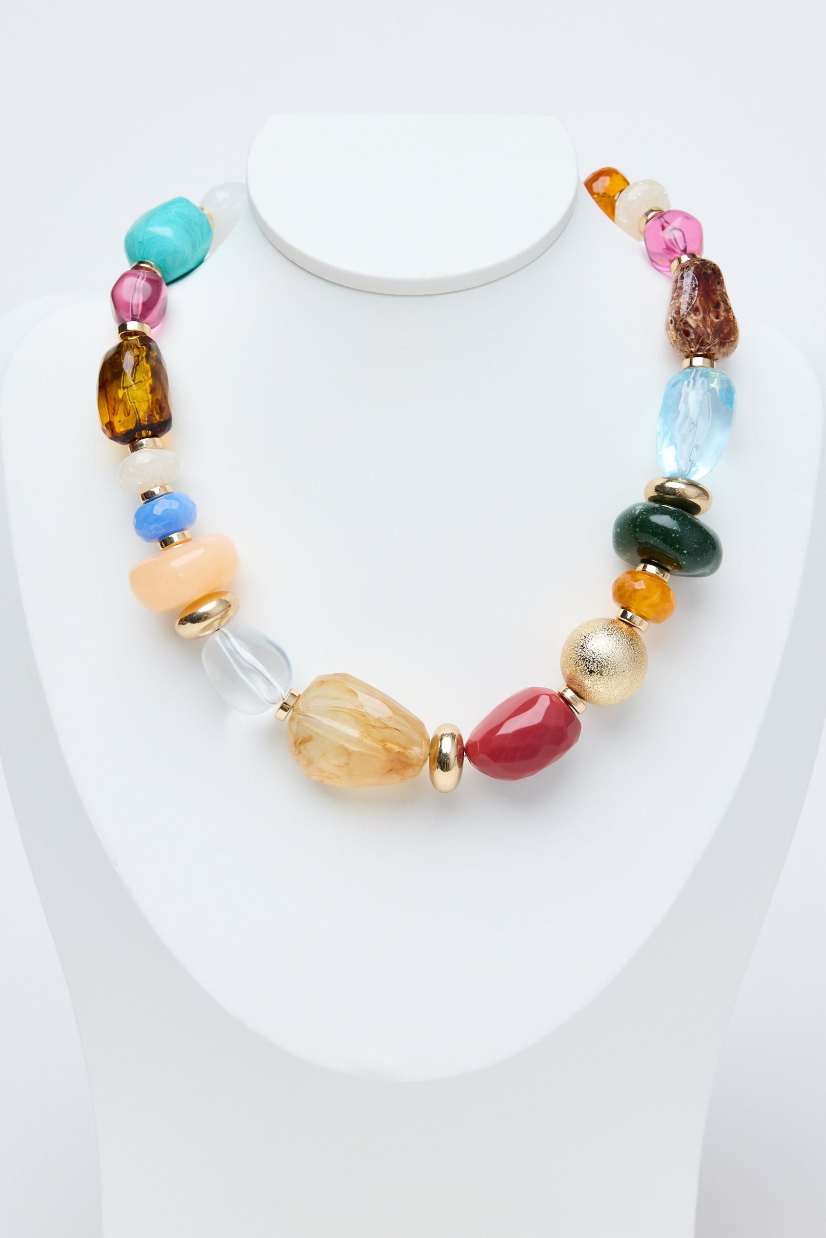 Multicolored beaded necklace on a white background