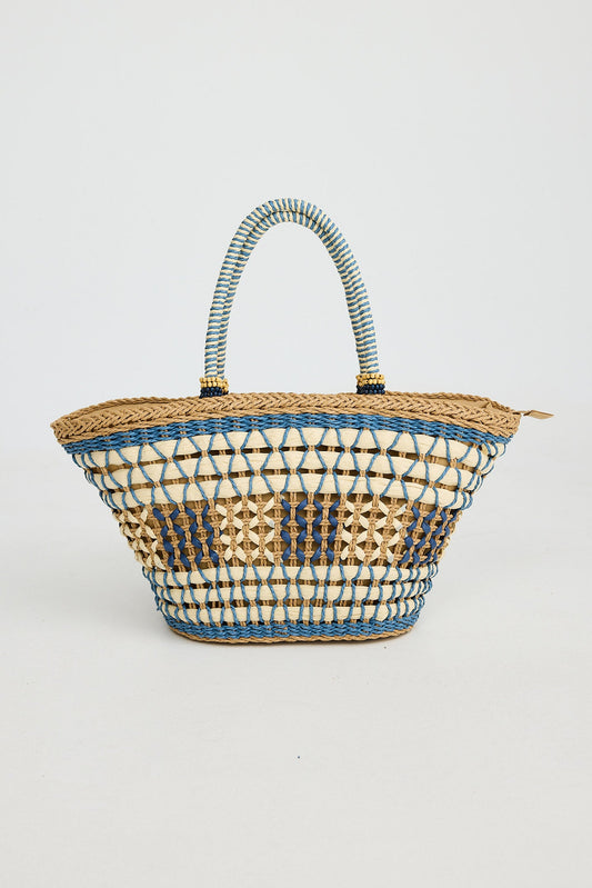 Woven handbag with striped pattern on a light gray background
