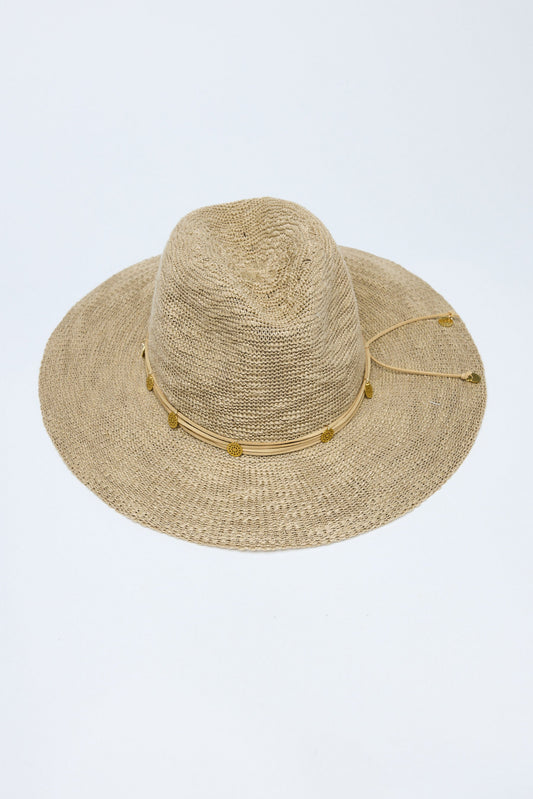 Beige straw hat with a wide brim on a light gray background