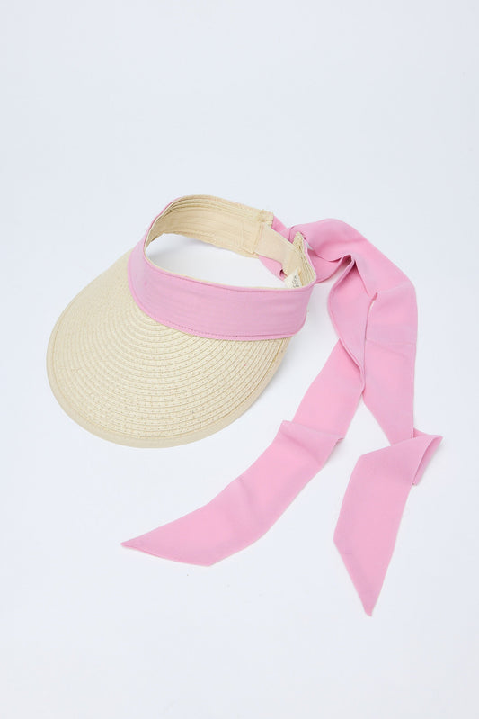 Beige visor with pink ribbon on a white background
