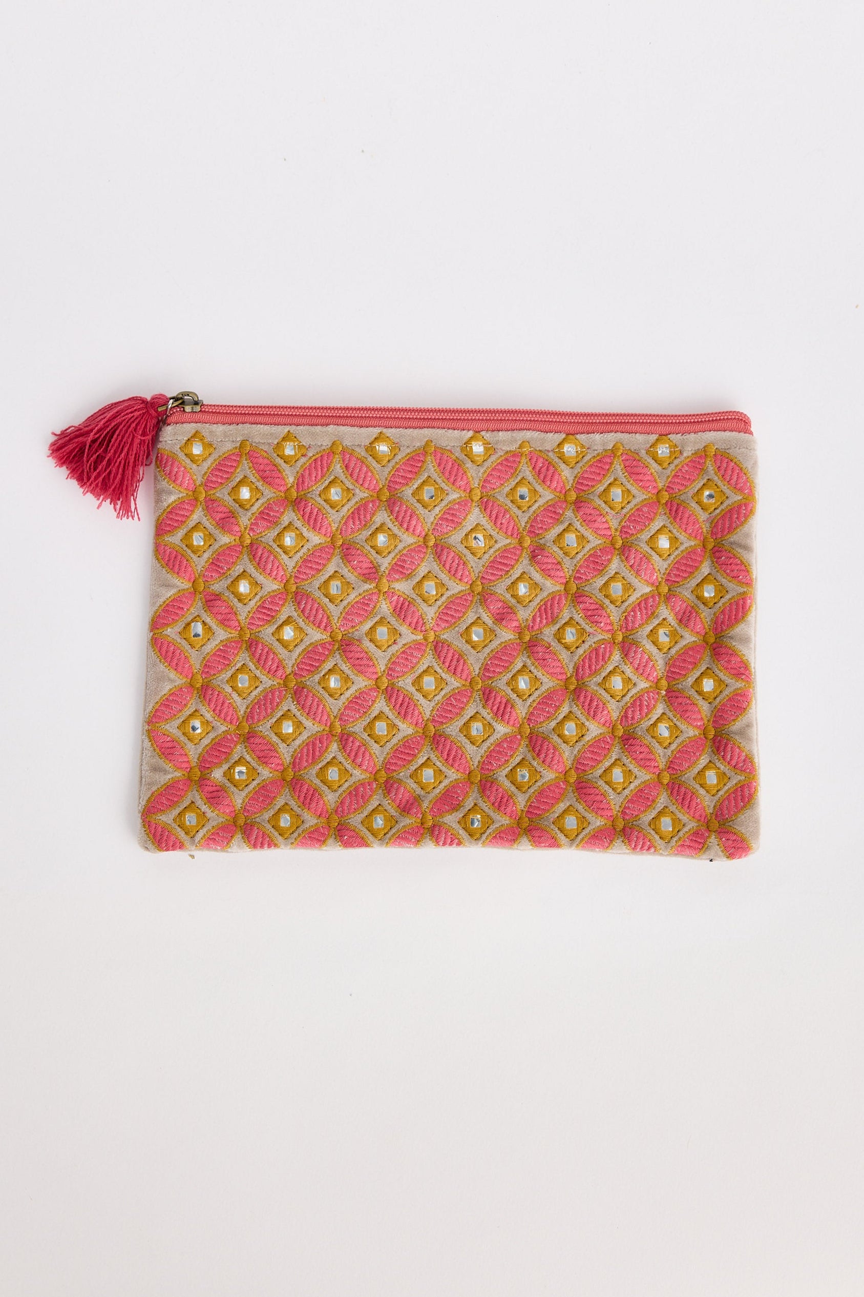 Patterned pouch with a tassel on a white background