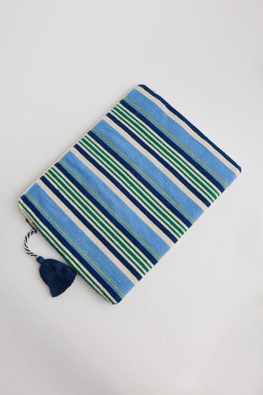 Striped fabric with blue and green pattern on a white background