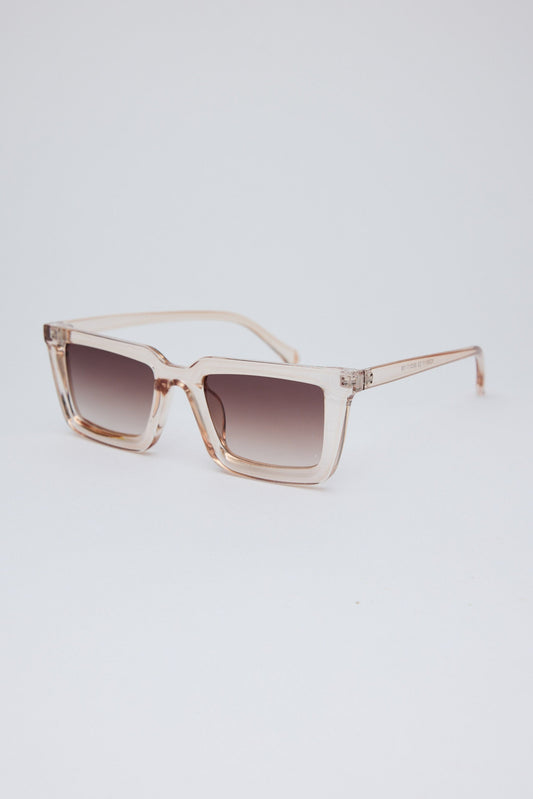 Angled view of Clear Coastline Sunglasses on white background