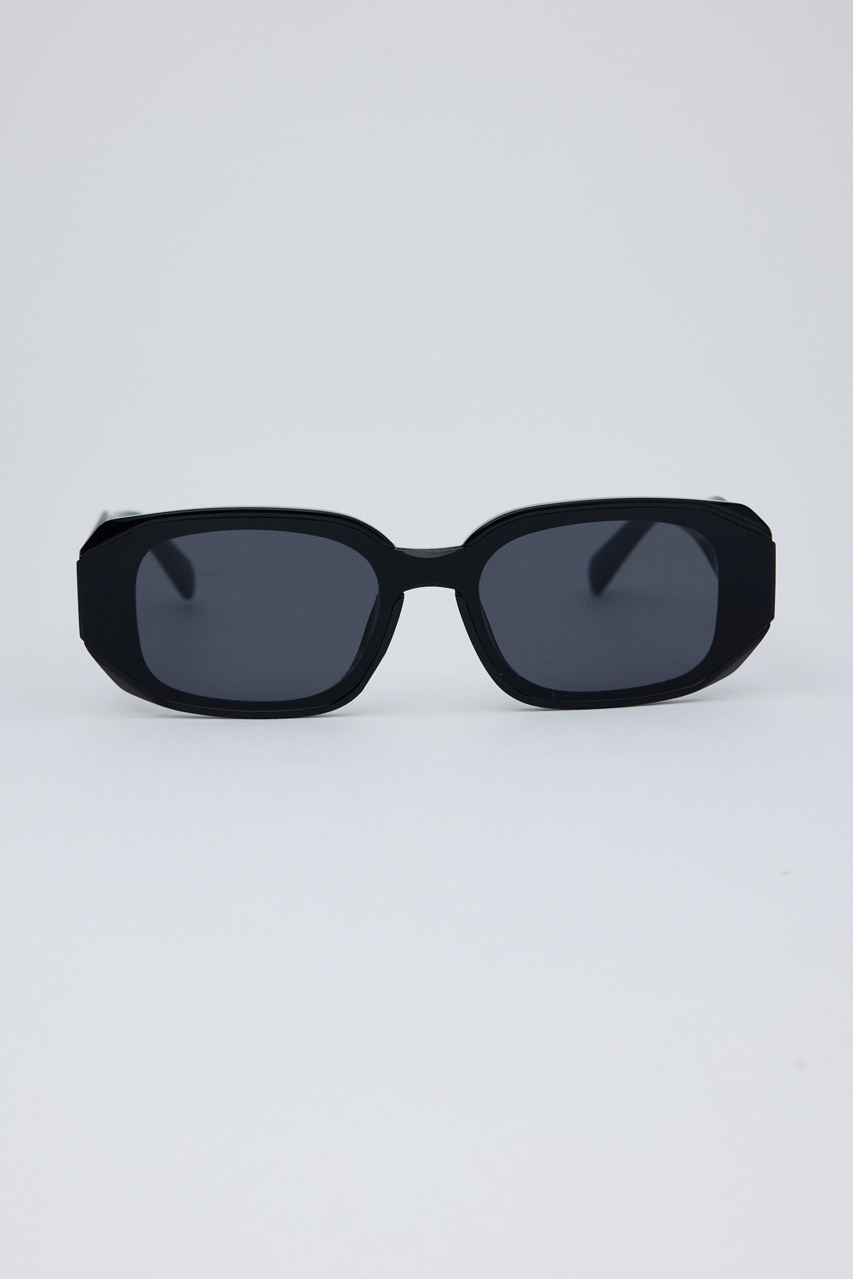 Black sunglasses on a white background