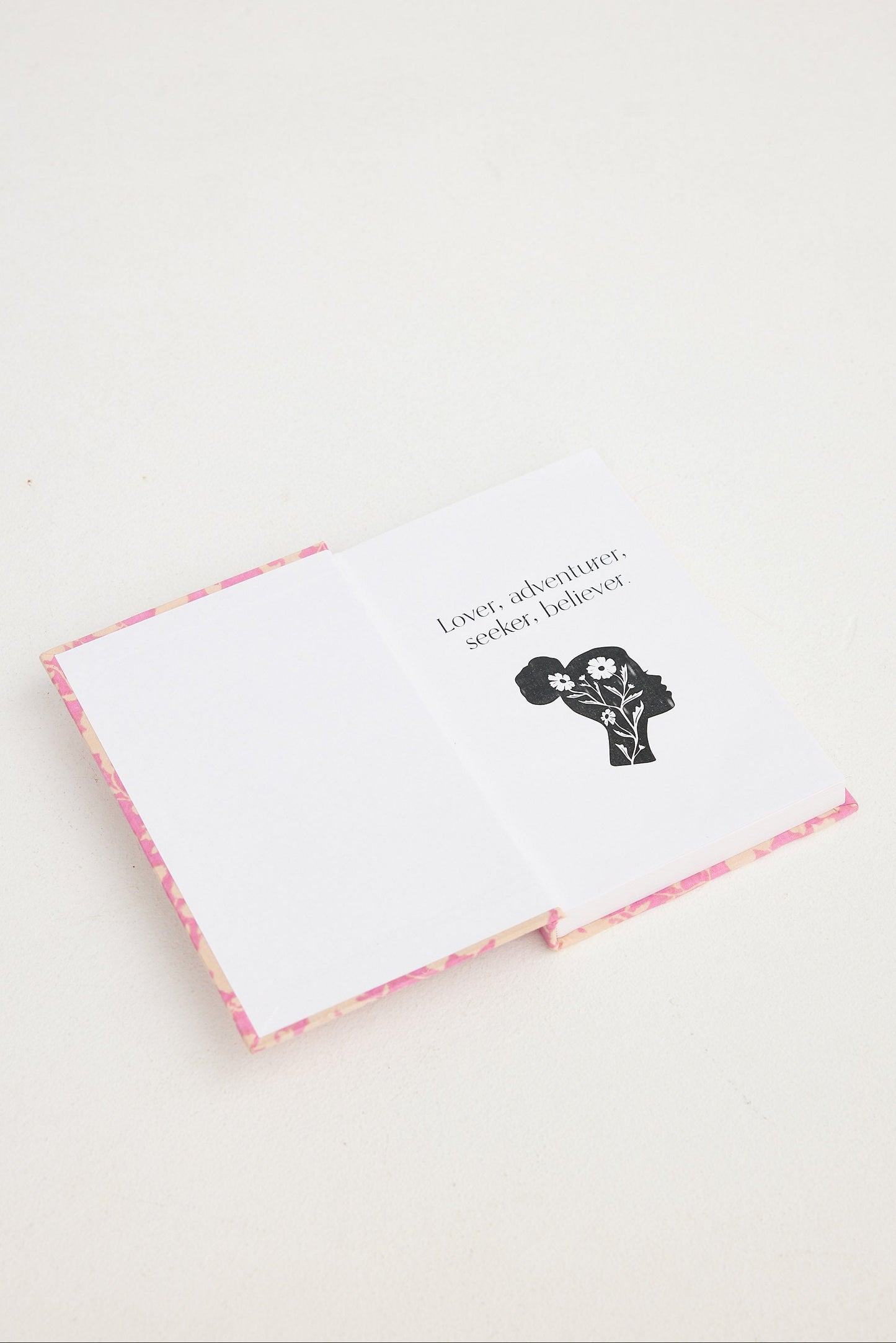 Notebook with a dog illustration and text on a white background