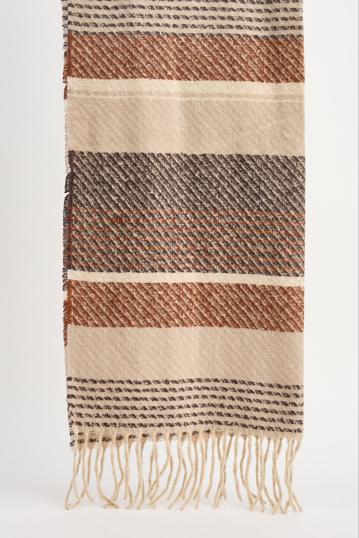 Striped woven scarf with fringes on a white background