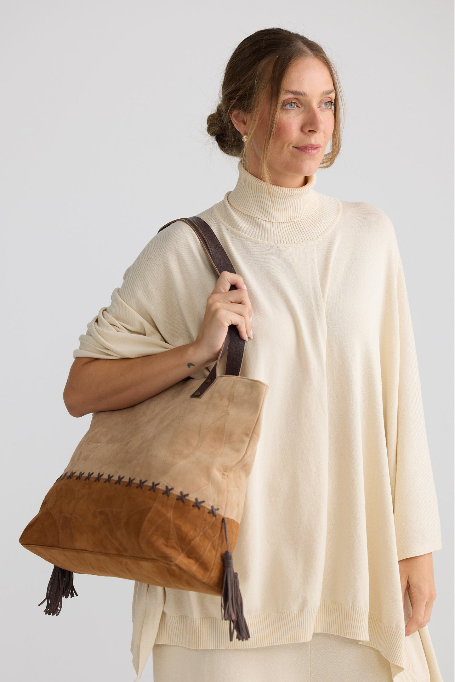 Wildside Hand Bag - Camel W Tan bag in camel with tan with textured finish, styled view on white background