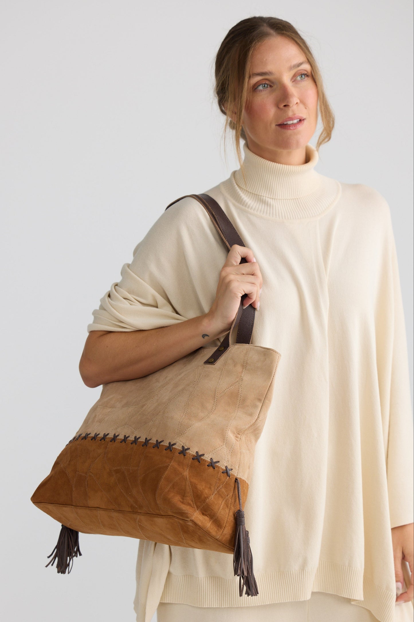 Wildside Hand Bag - Camel W Tan bag in camel with tan with textured finish, detail view on white background