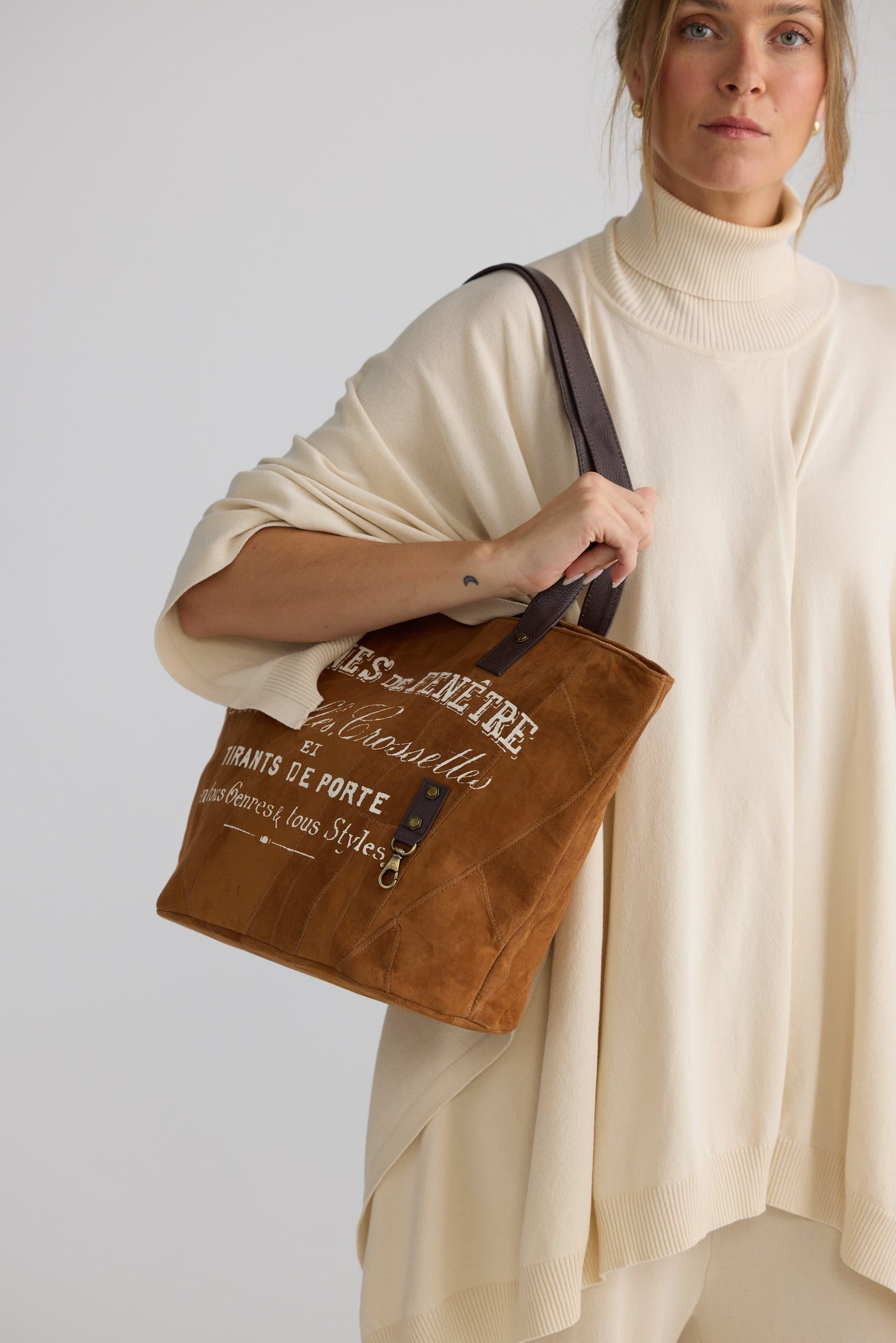Cremones Bag - Tan bag in tan with structured silhouette, styled view on white background
