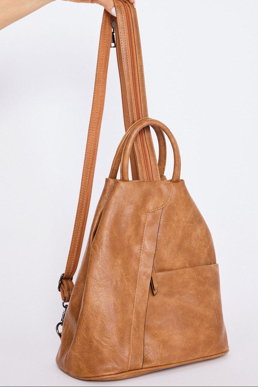 Hidden Valley Backpack - Tan backpack in tan with structured silhouette, front view on white background