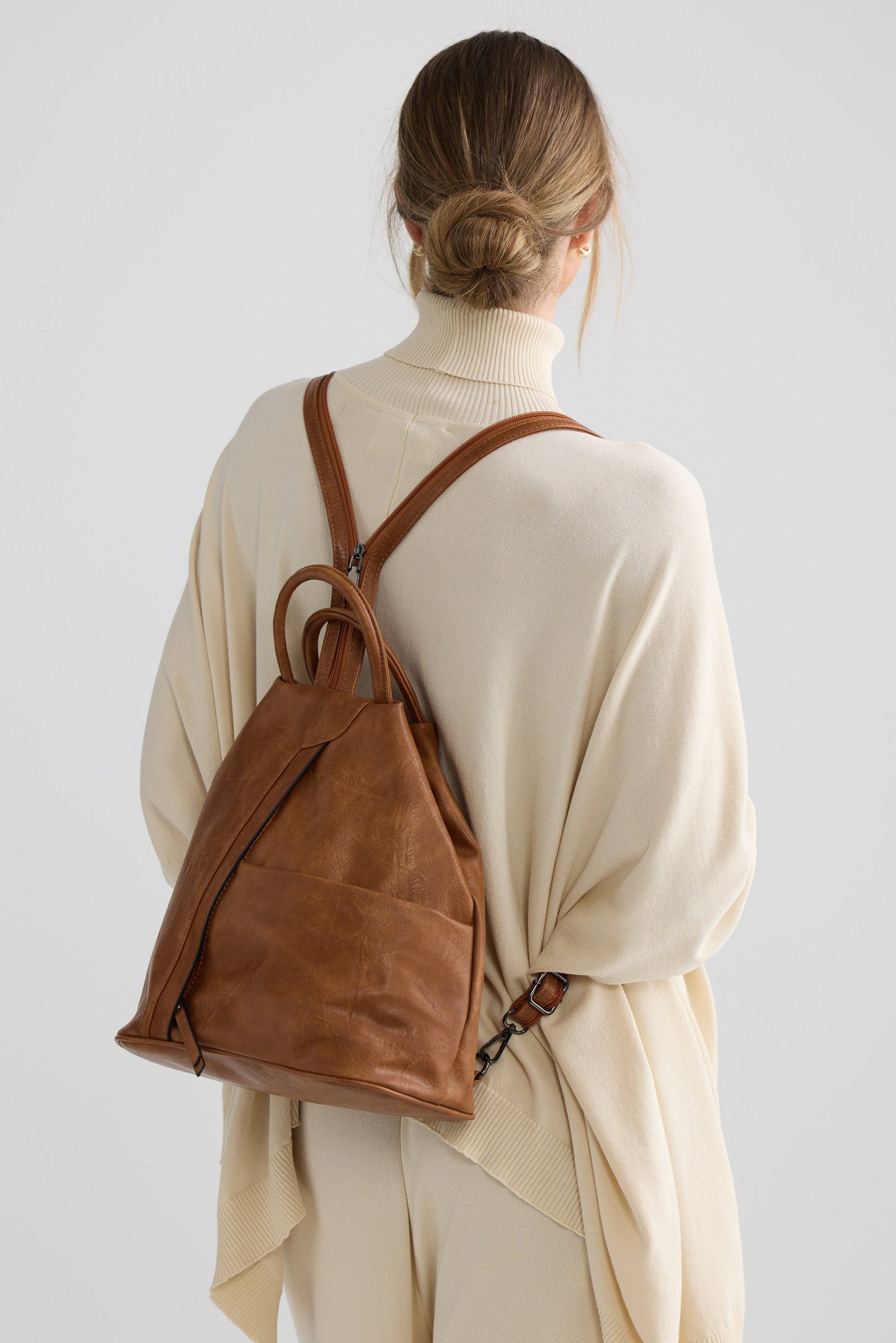 Hidden Valley Backpack - Tan backpack in tan with structured silhouette, alternate view on white background
