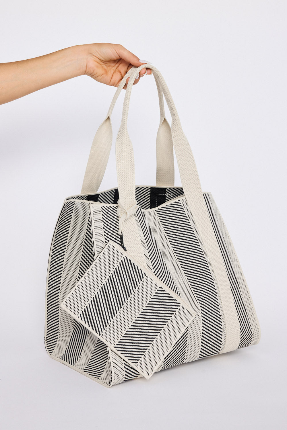 Bellagio Tote Bag - Black tote bag in black with geometric weave, front view on white background