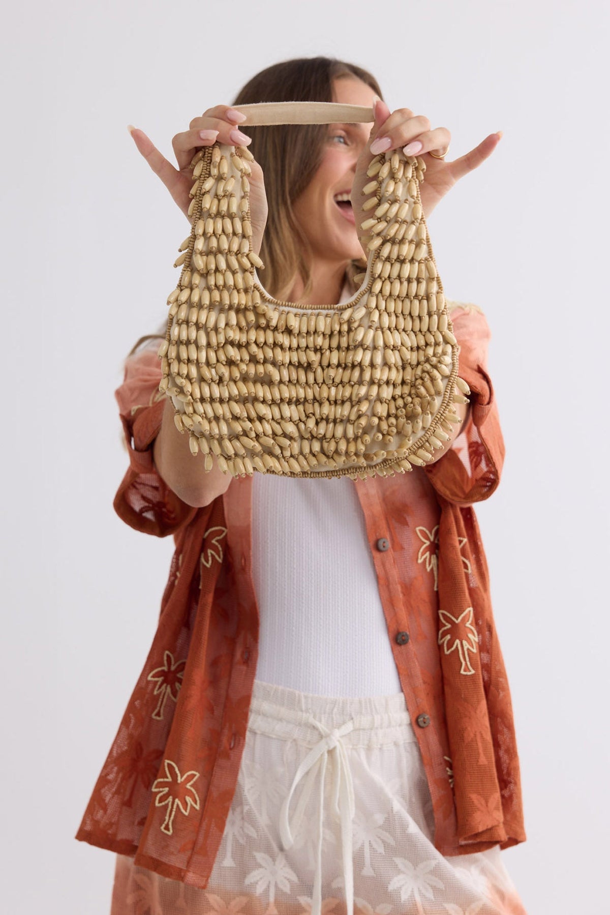 Rafiki Beaded Bag in beige, detail view.