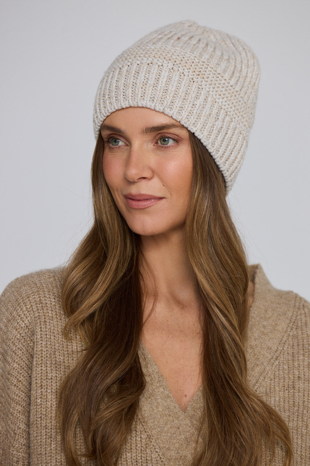 Solver Beanie - Oyster beanie in oyster with ribbed texture, alternate view on white background