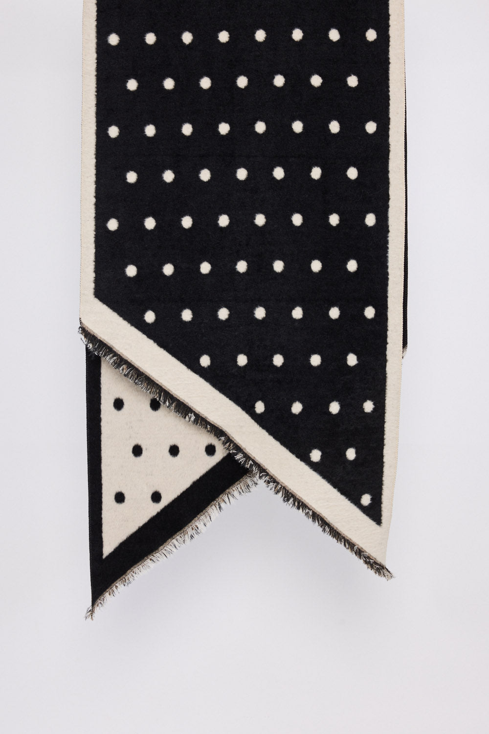 Gallery Scarf - Black scarf in black with polka dot design, front view on white background