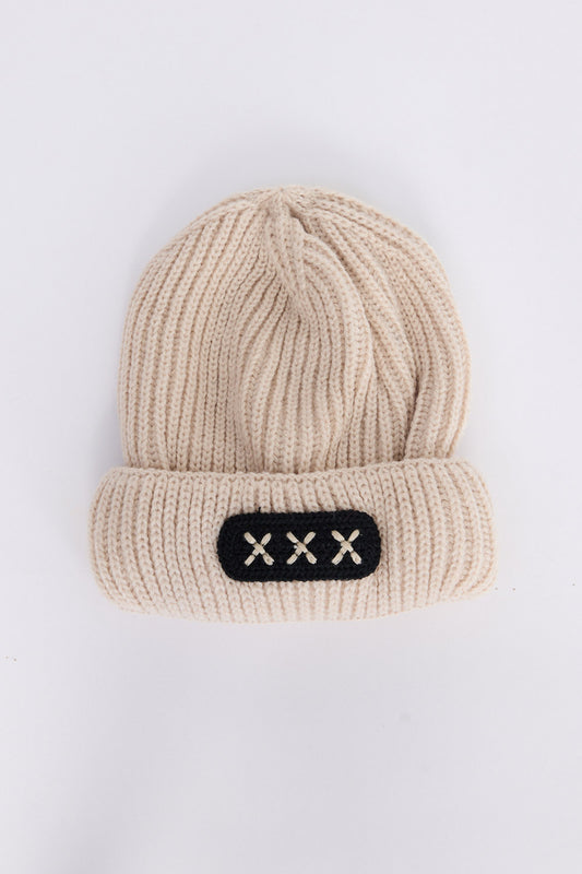 Benny Kids Beanie - Stone kids' beanie in stone with rib knit texture, front view on white background