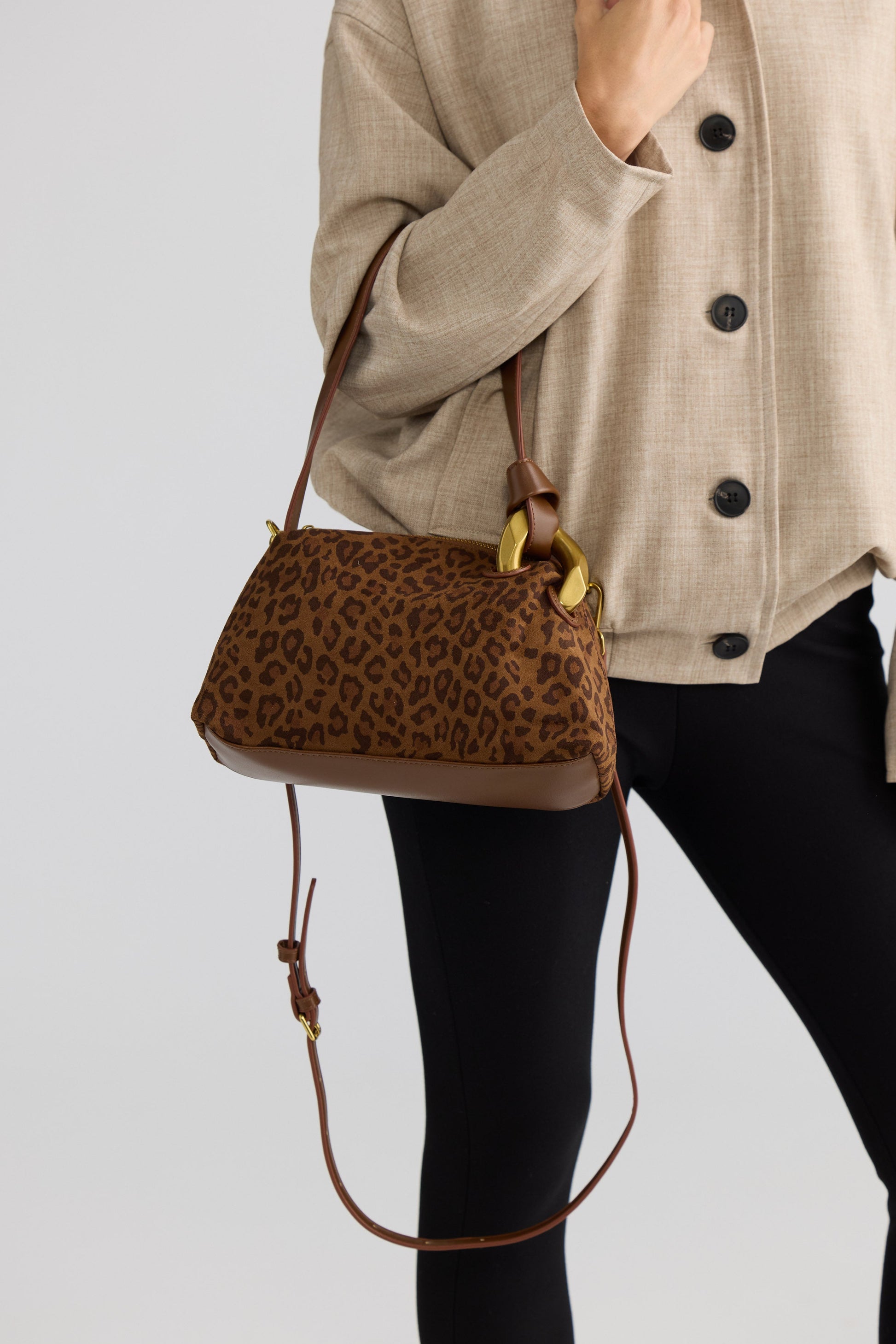Lola Handbag - Leopard handbag in leopard with leopard print, styled view on white background