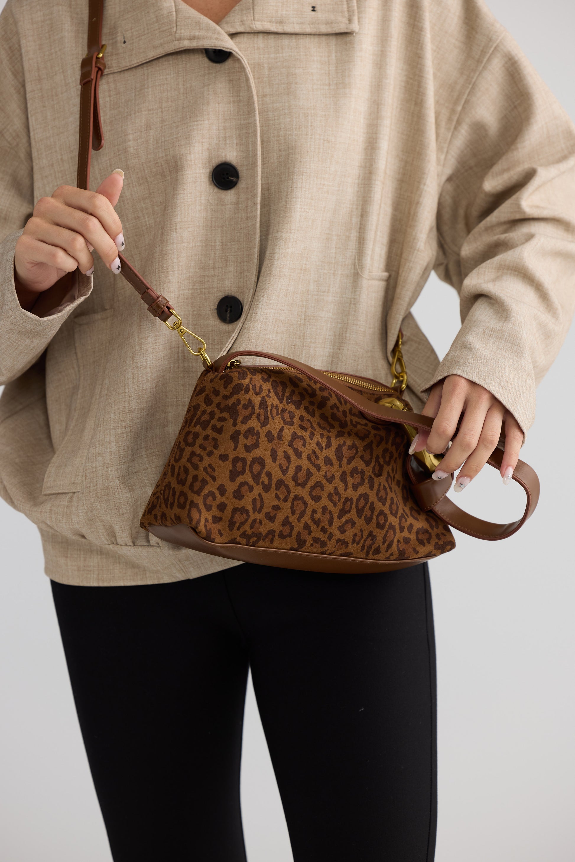 Lola Handbag - Leopard handbag in leopard with leopard print, styled view on white background