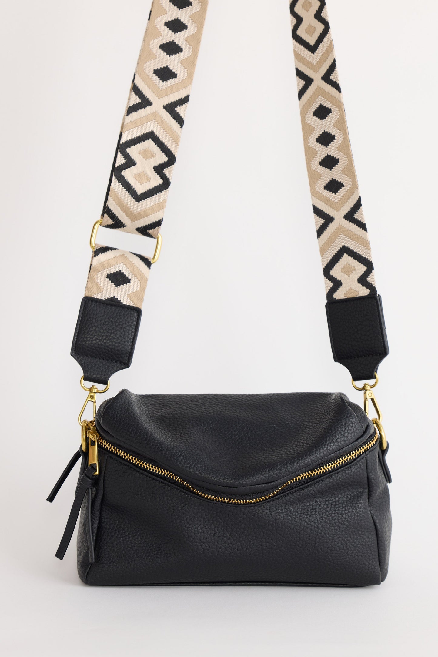 Sloane Crossbody Bag - Black crossbody bag in black with woven texture, front view on white background