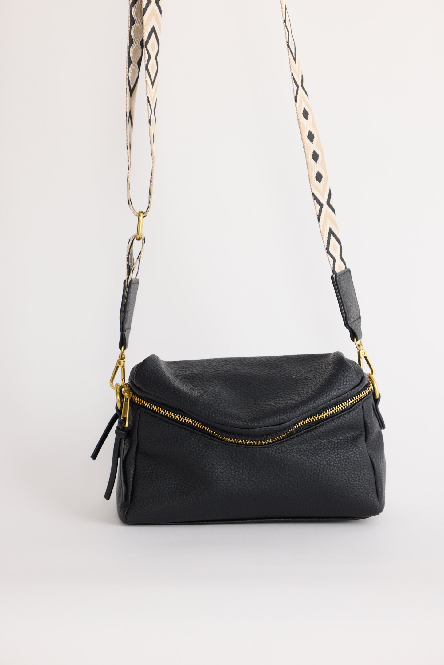 Sloane Crossbody Bag - Black crossbody bag in black with woven texture, alternate view on white background