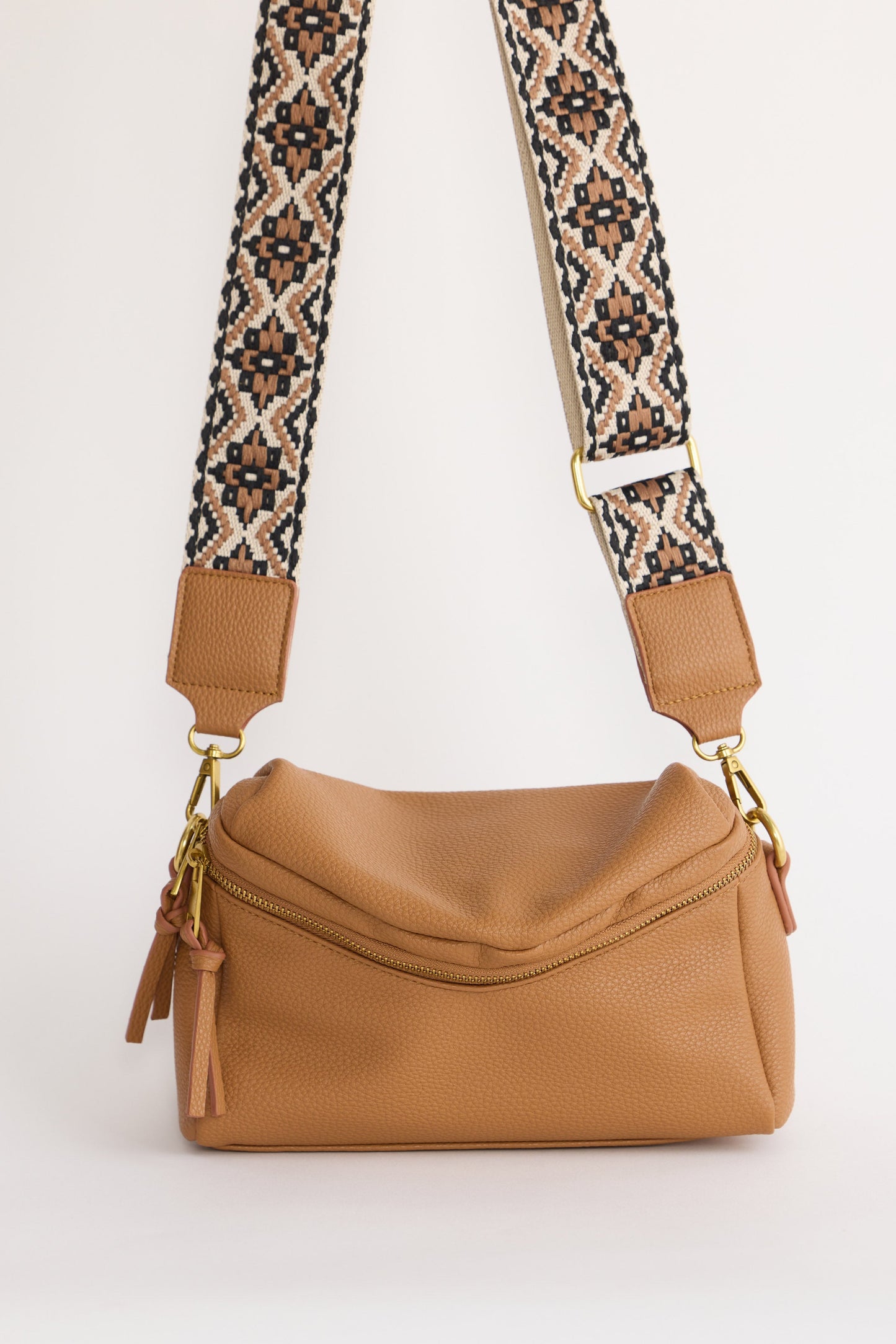 Sloane Crossbody Bag - Tan crossbody bag in tan with woven texture, front view on white background