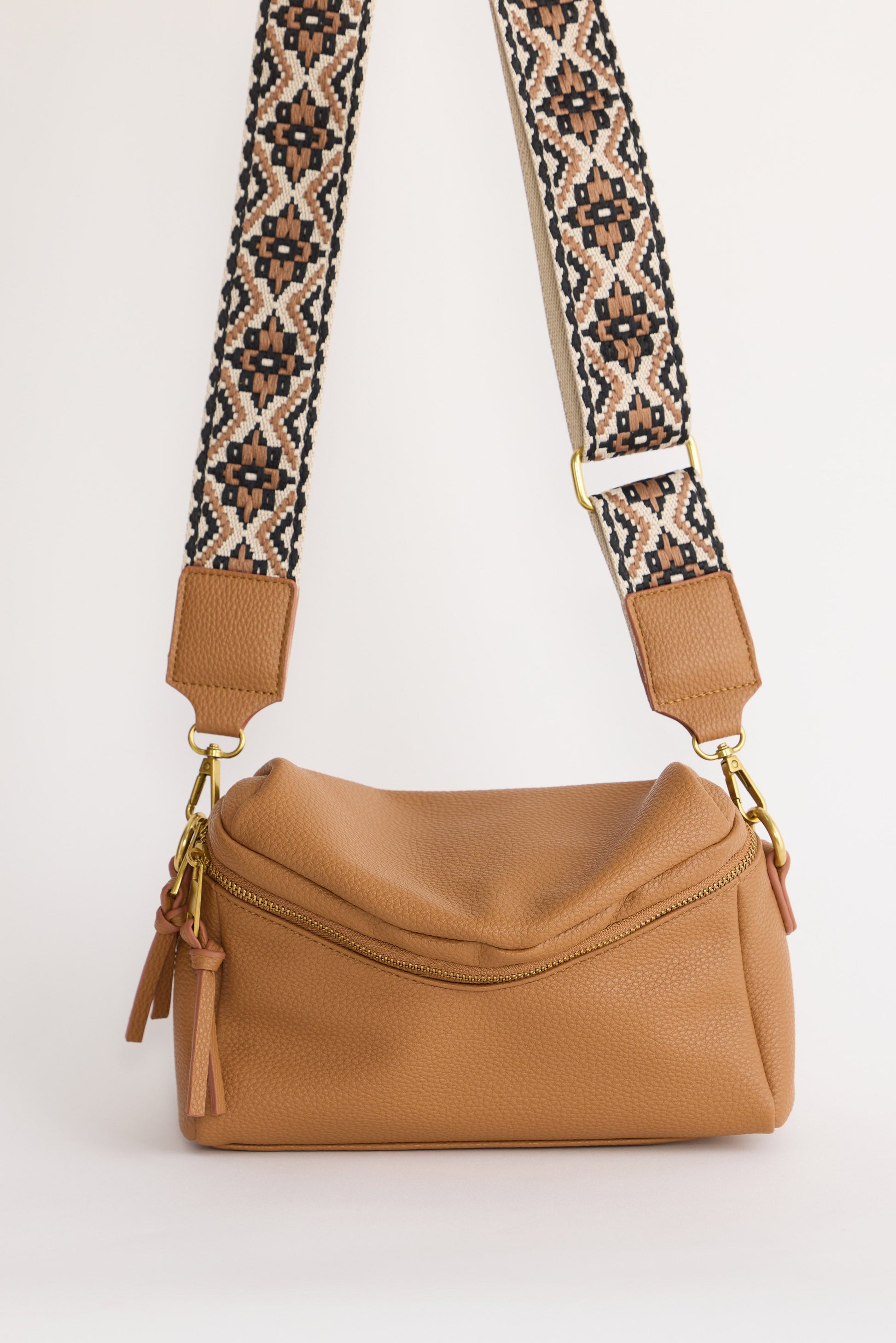 Sloane Crossbody Bag - Tan crossbody bag in tan with woven texture, front view on white background