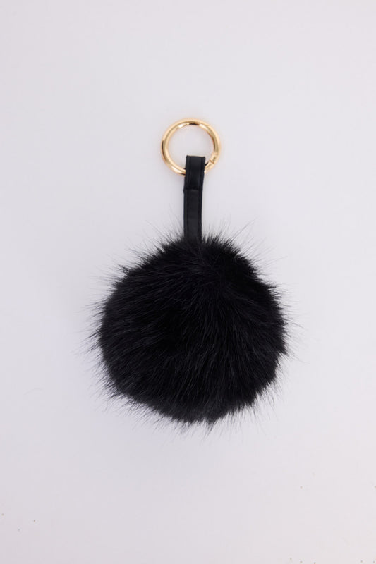 Luna Keyring - Black keyring in black with faux fur pom detail, front view on white background