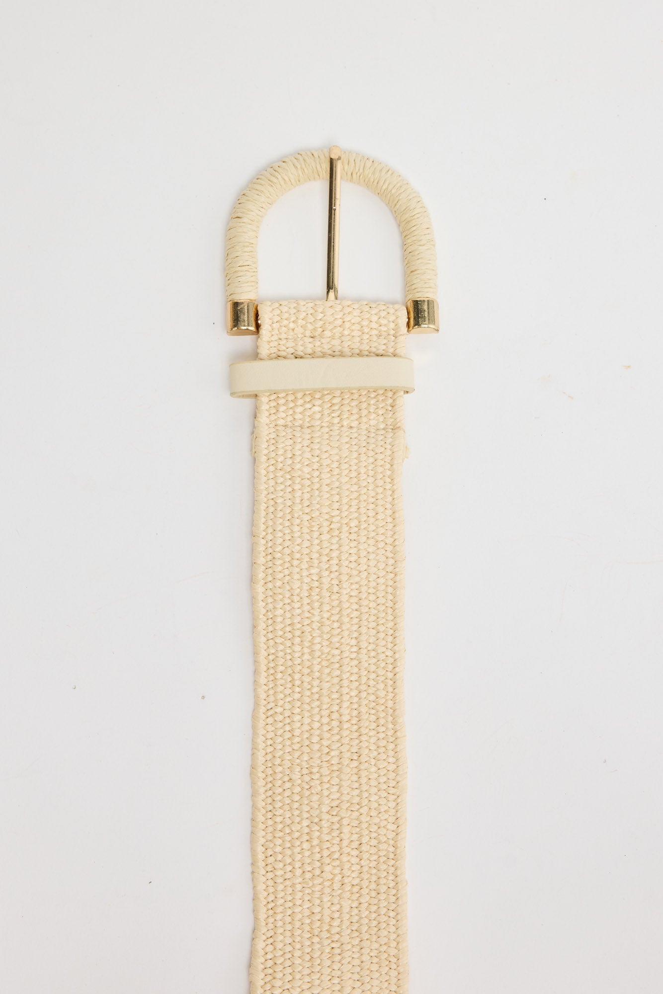 Reid Belt in beige - ivory woven stretch belt with a matching cord-wrapped D-ring buckle, flat lay
