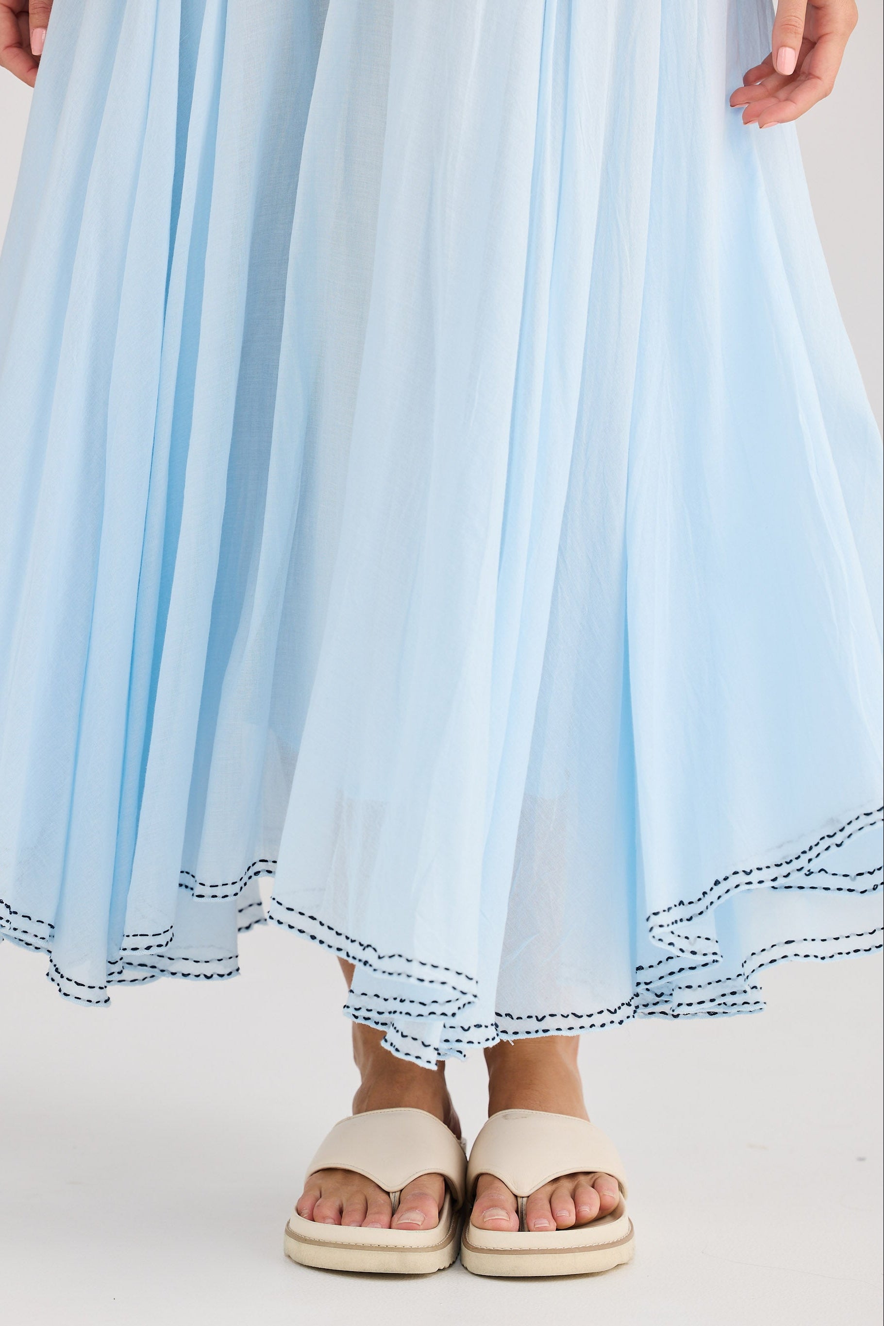 Light blue skirt with a white background