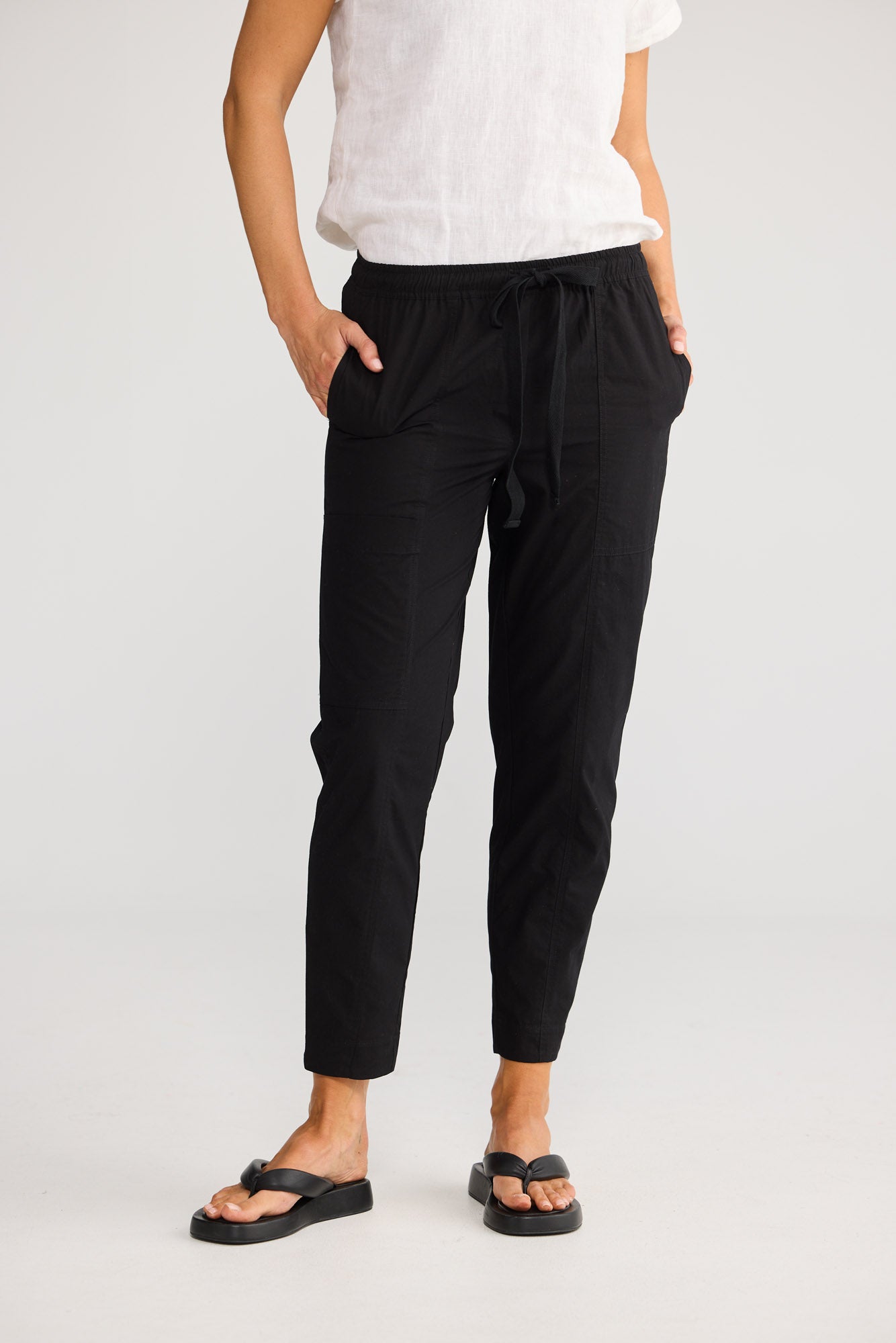 Reva Cargo Pant in Black with elasticated waistband with tie.