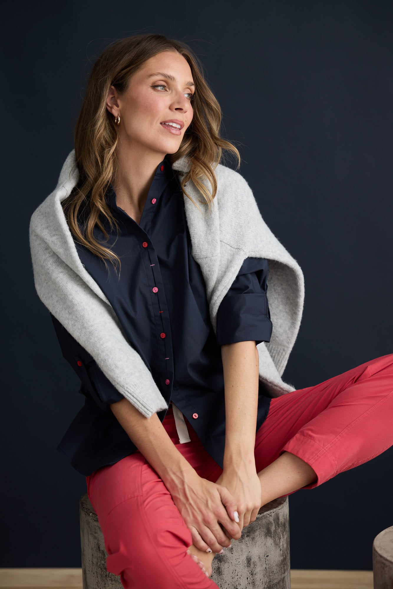 Model wearing Fae Shirt Navy with contrast buttons and stitching, campaign lifestyle view