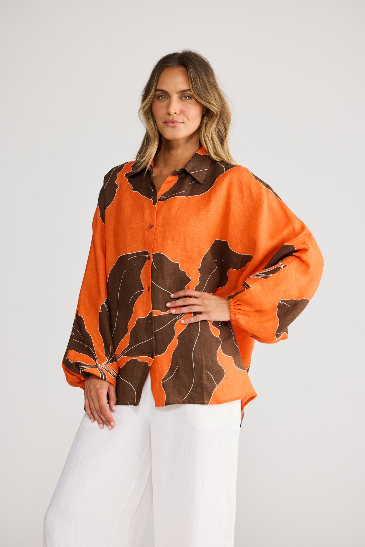 Cliffside Shirt in Hibiscus Breeze with oversized shirt with button front opening.