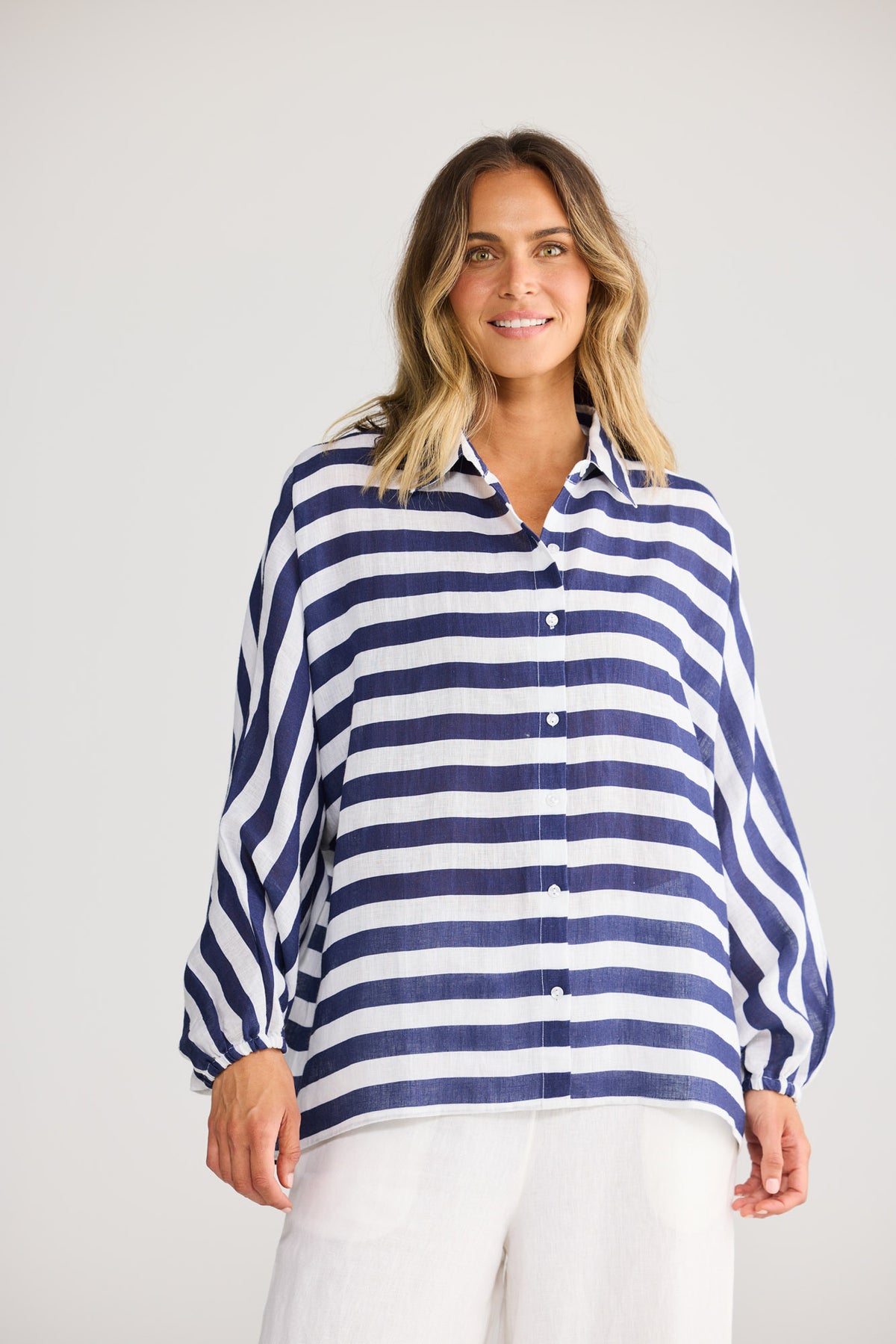Cliffside Shirt in Navy Stripe with oversized shirt with button front opening.