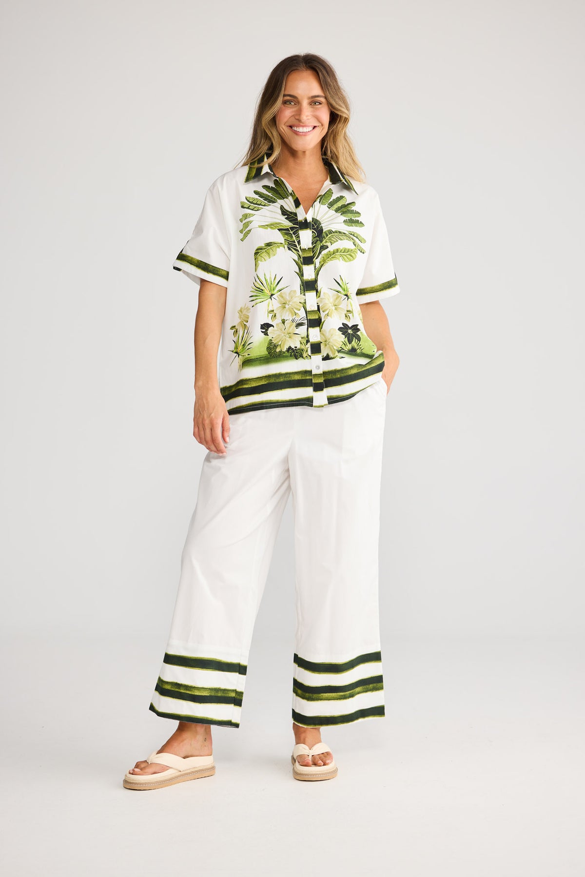 Nalani Shirt in Botanica Print with short sleeve with sleeve tab detail.