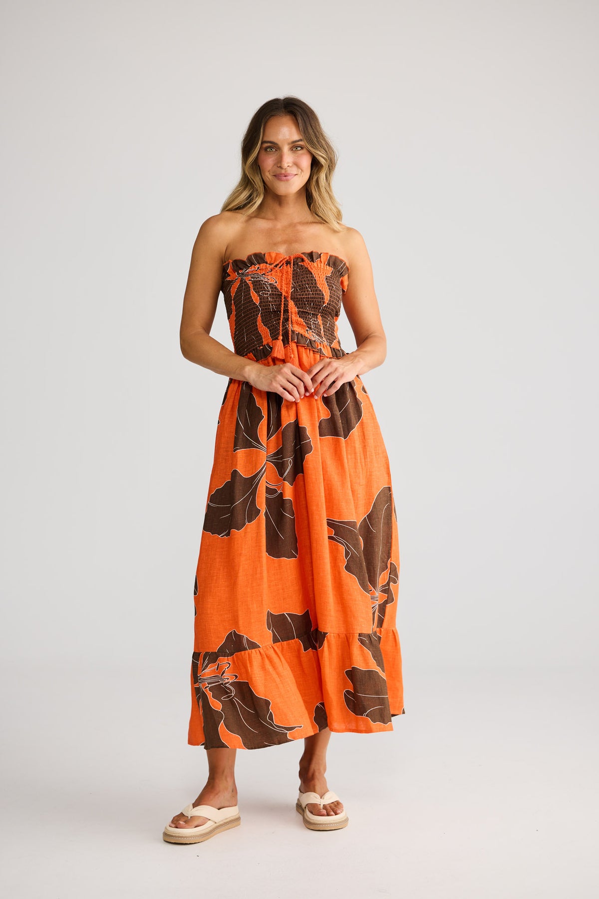 Sorrel Dress in Hibiscus Breeze with strapless midi length dress.