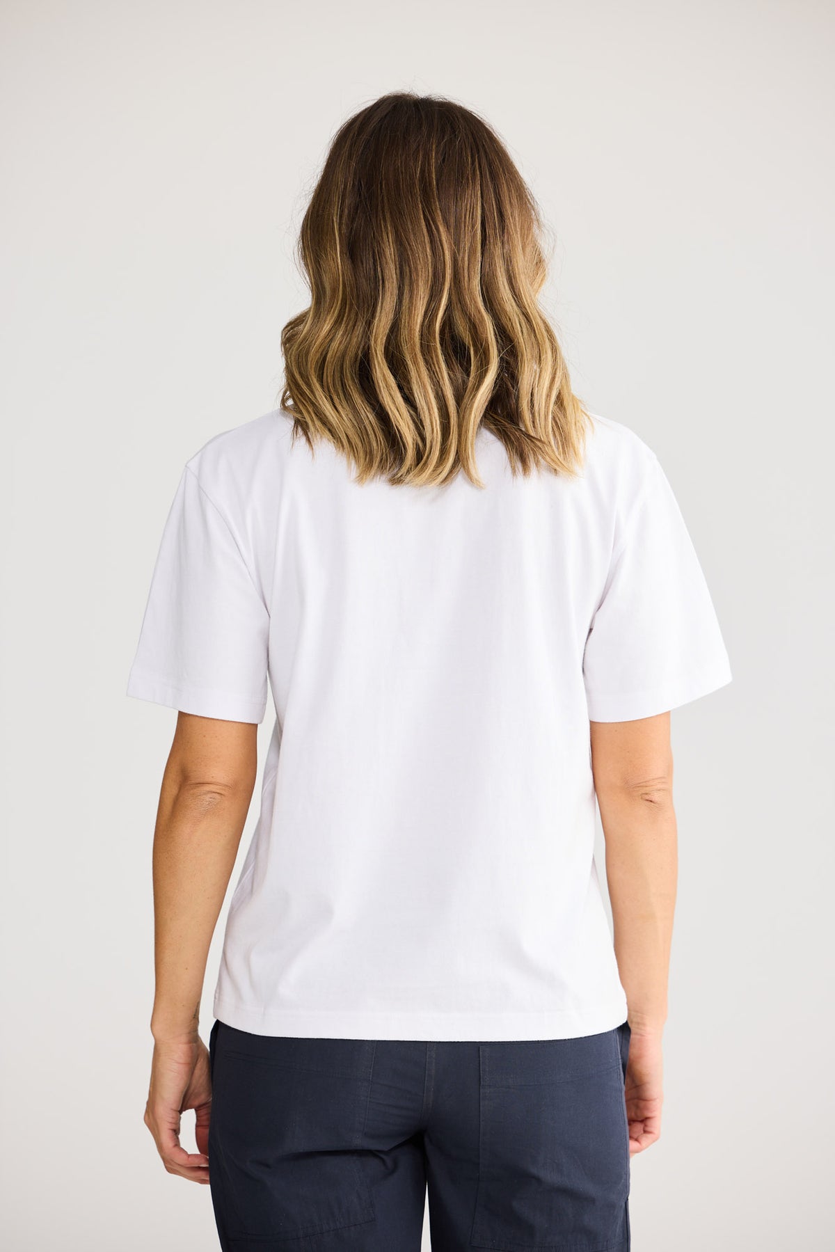 Cove Tee in White with short sleeve.