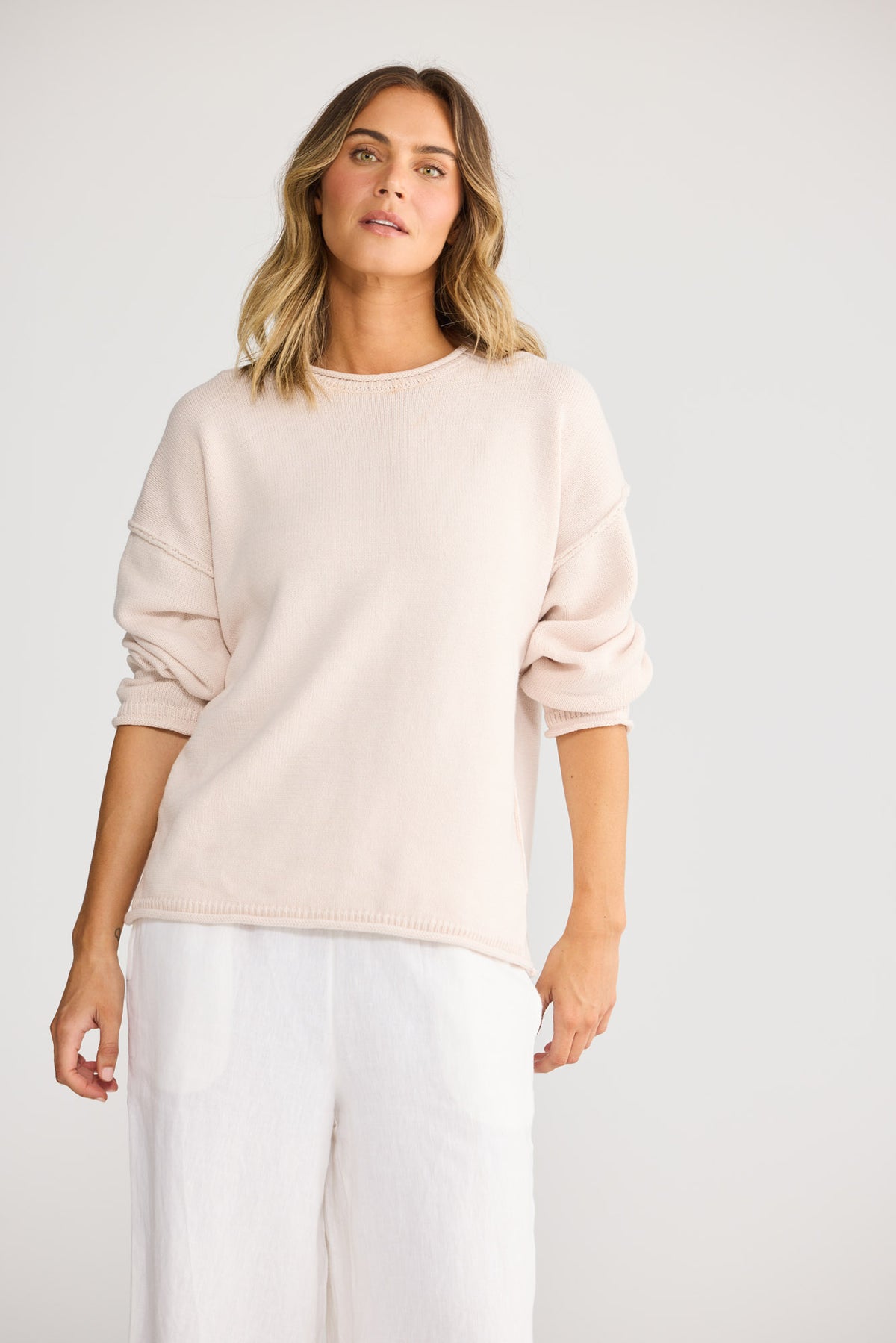 Breaker Knit Sweater in Dove with rolled edge at neck, cuff and hem.