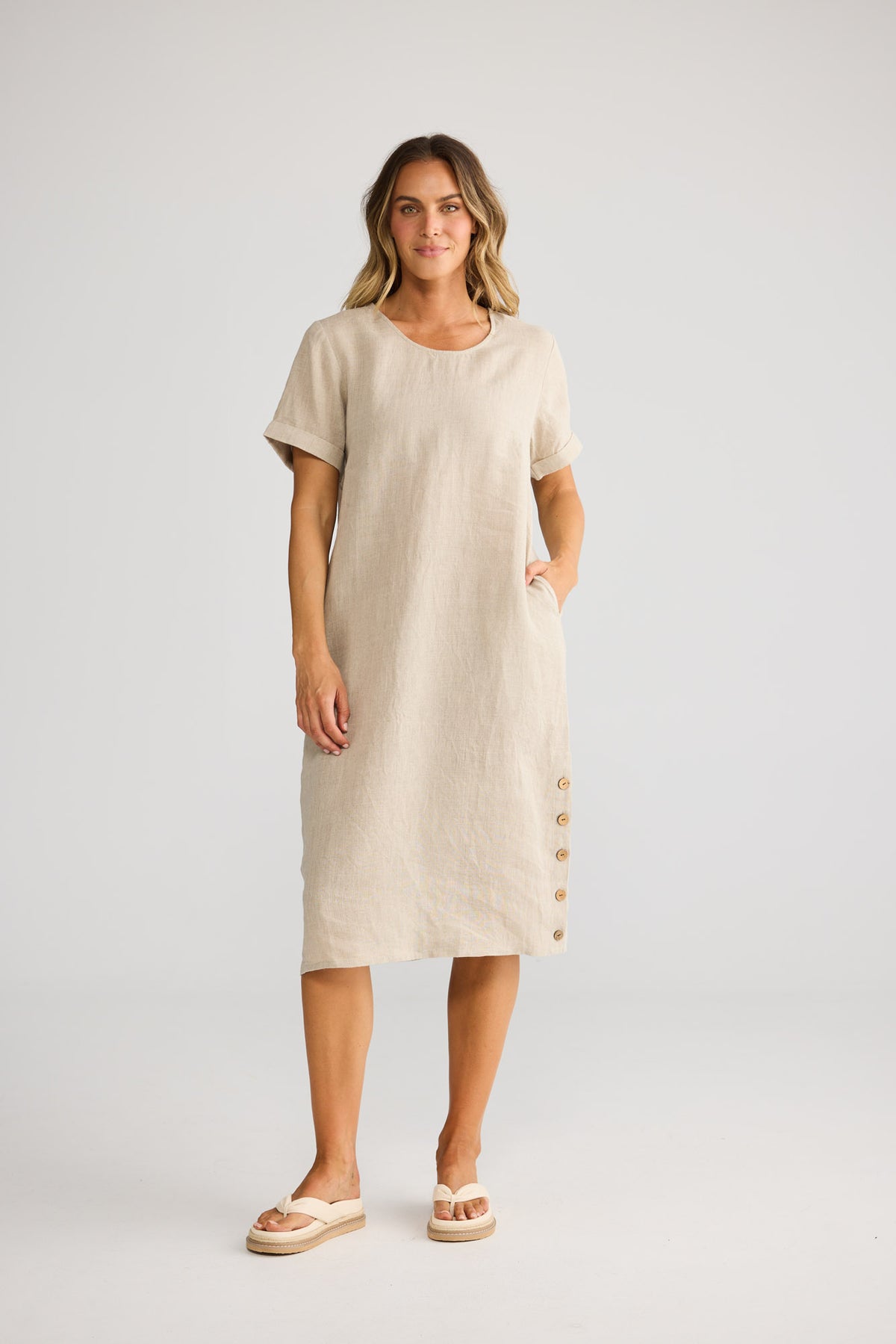 Foreshore Dress in Natural Linen with short sleeve with rolled cuff.
