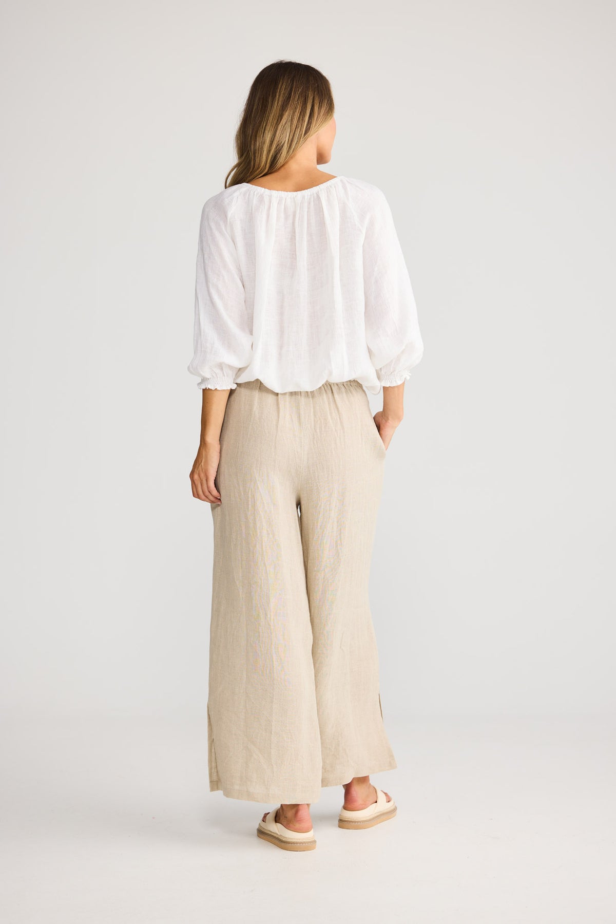 Seaside Top in White with neck tie with tassels.