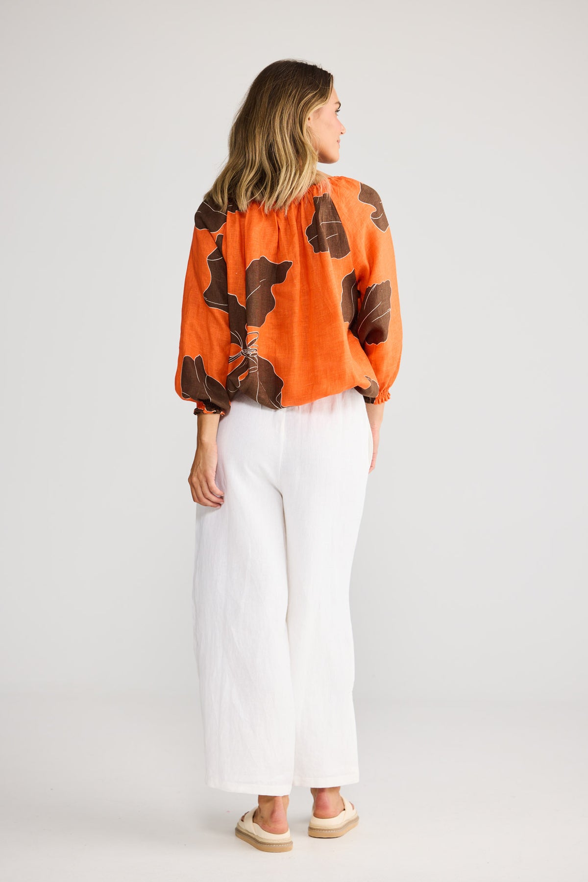 Seaside Top in Hibiscus Breeze with neck tie with tassels.