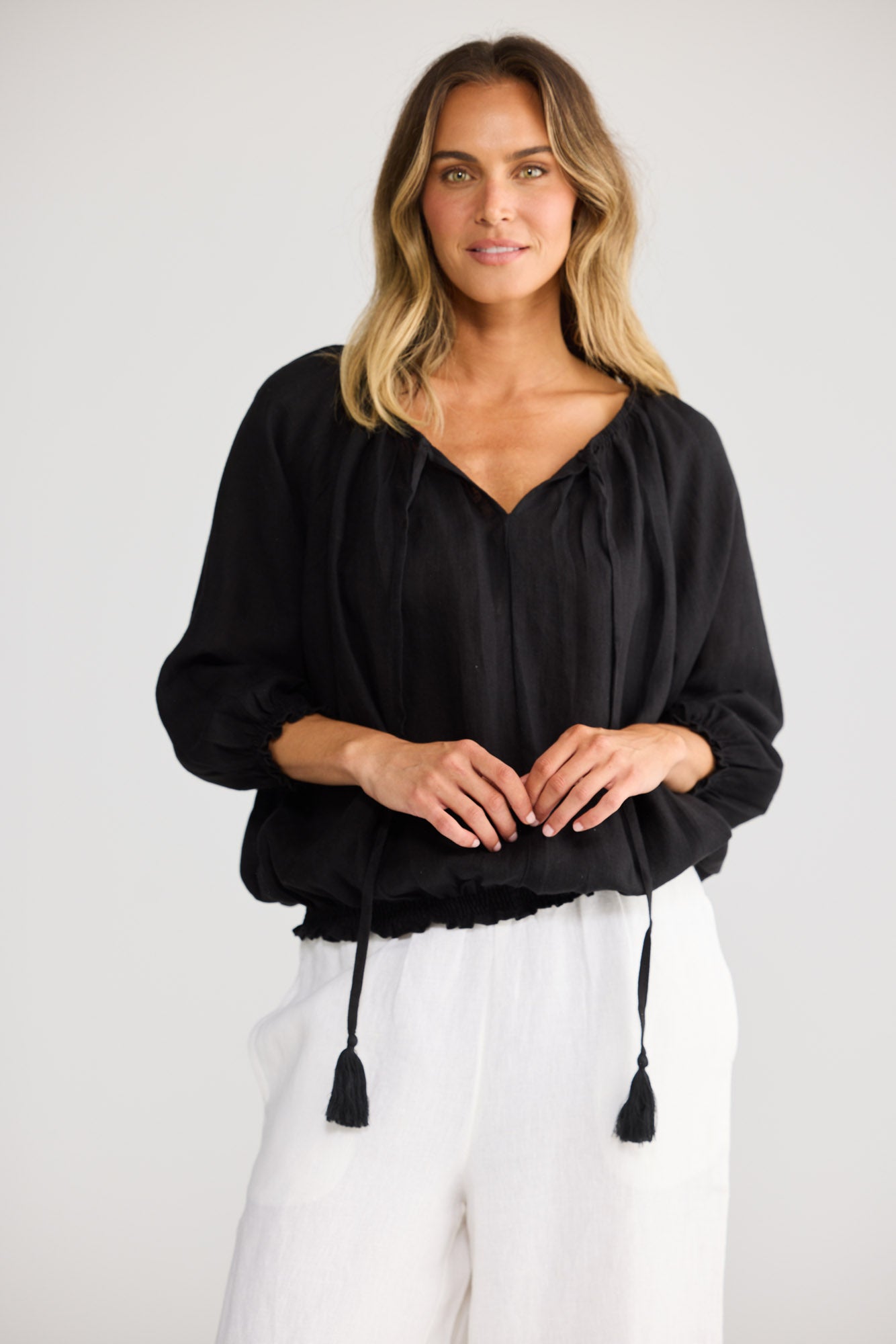 Seaside Top in Black with neck tie with tassels.
