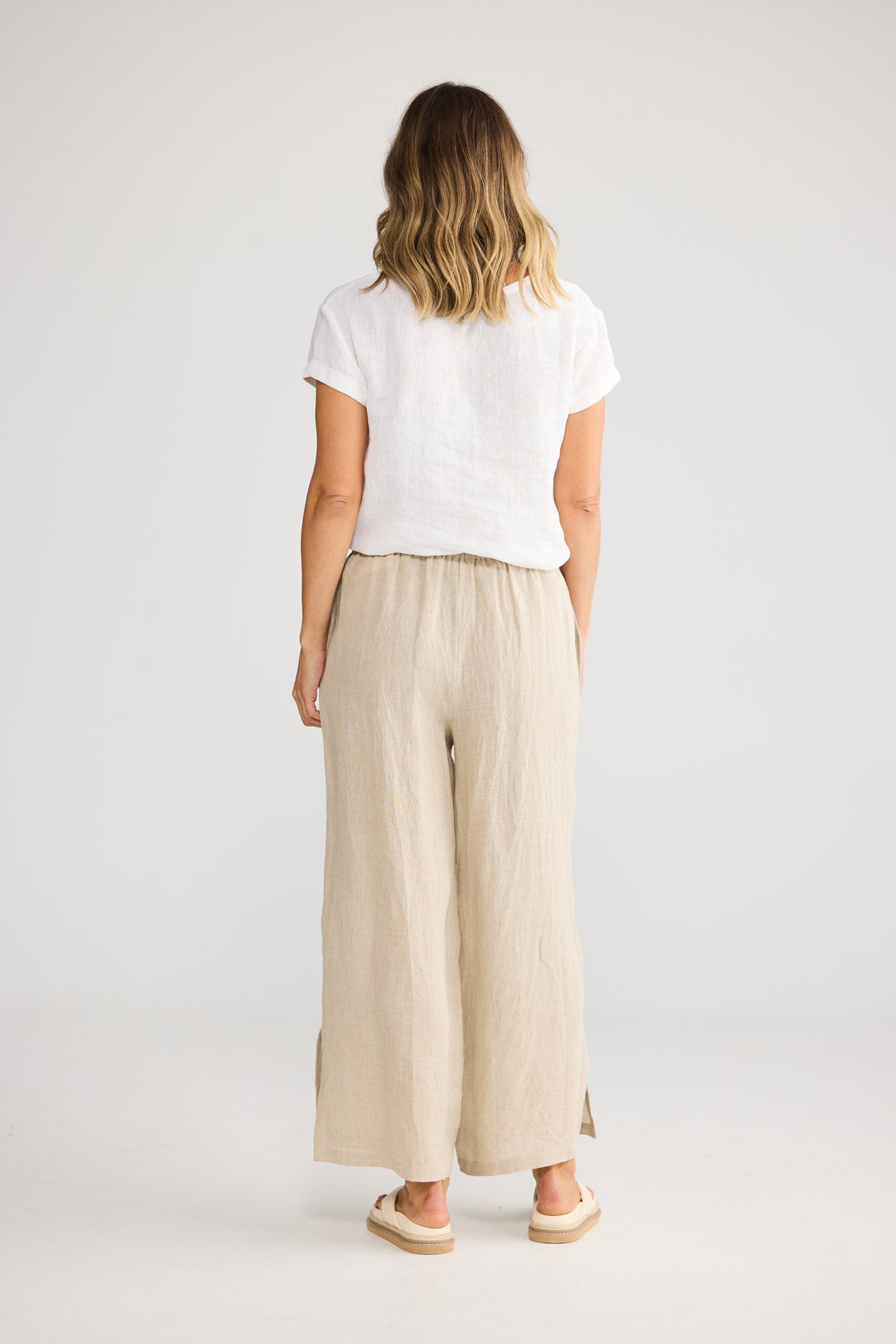 Fly Away Pant in Natural Linen with relaxed wide leg.