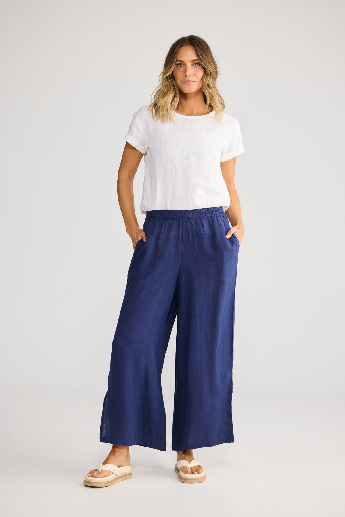 Fly Away Pant in Navy with full length.